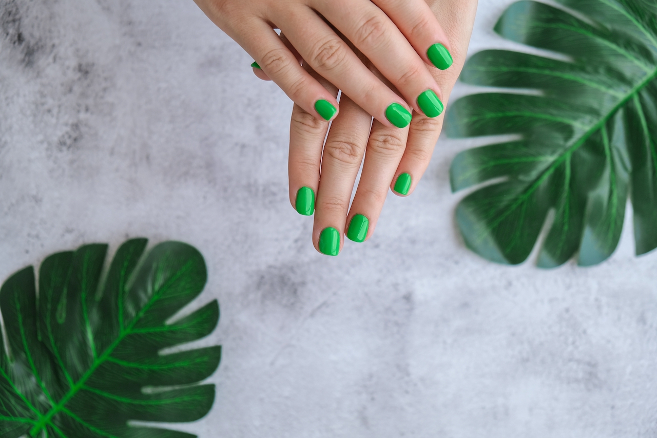 manicured-female-hands-with-stylish-green-nails-t-2021-10-04-18-37-27-utc.jpg